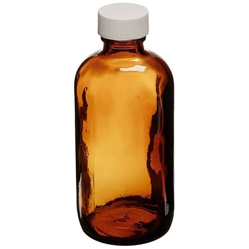 2 oz Amber Boston Round Bottle with White Polypropylene Closure N9235